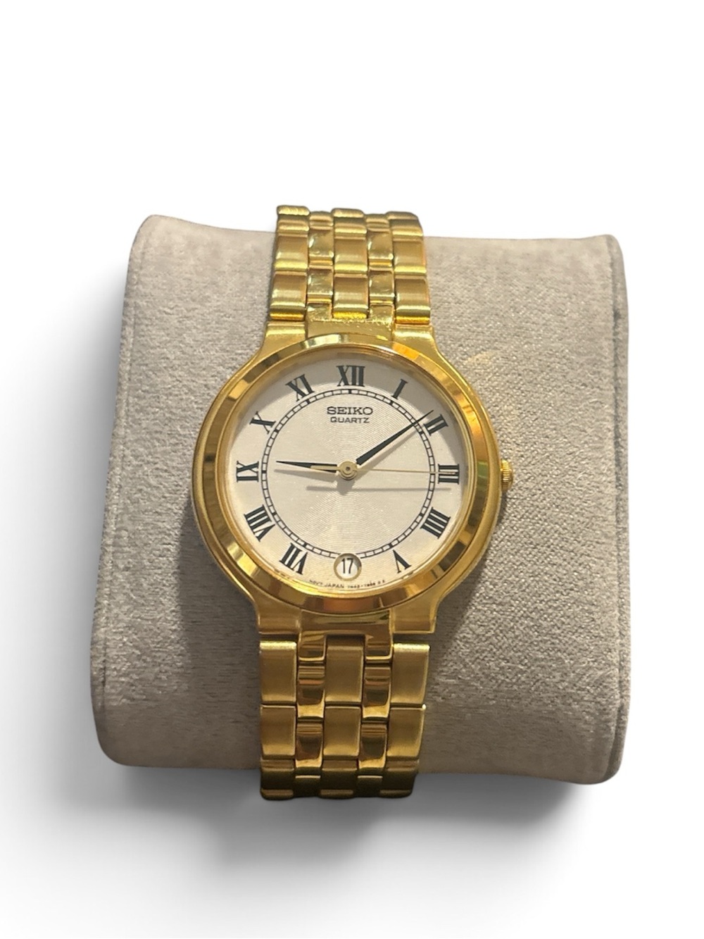 SEIKO unisex gold tone watch date window